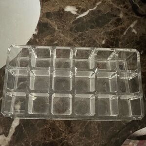 Clear lipstick organizer.